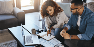Small Business Owners Going Over Docs